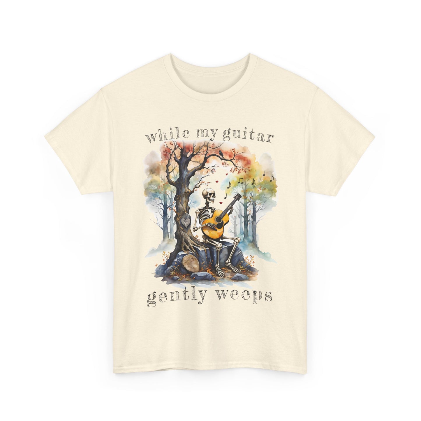 This gothic skeleton T-shirt featuring a grisly guitarist jamming on an acoustic guitar in a haunting watercolor forest is a stunning tongue-in-cheek homage to the Beatles music. This stunning design looks great on this natural colored Gildan unisex heavy cotton t-shirt.