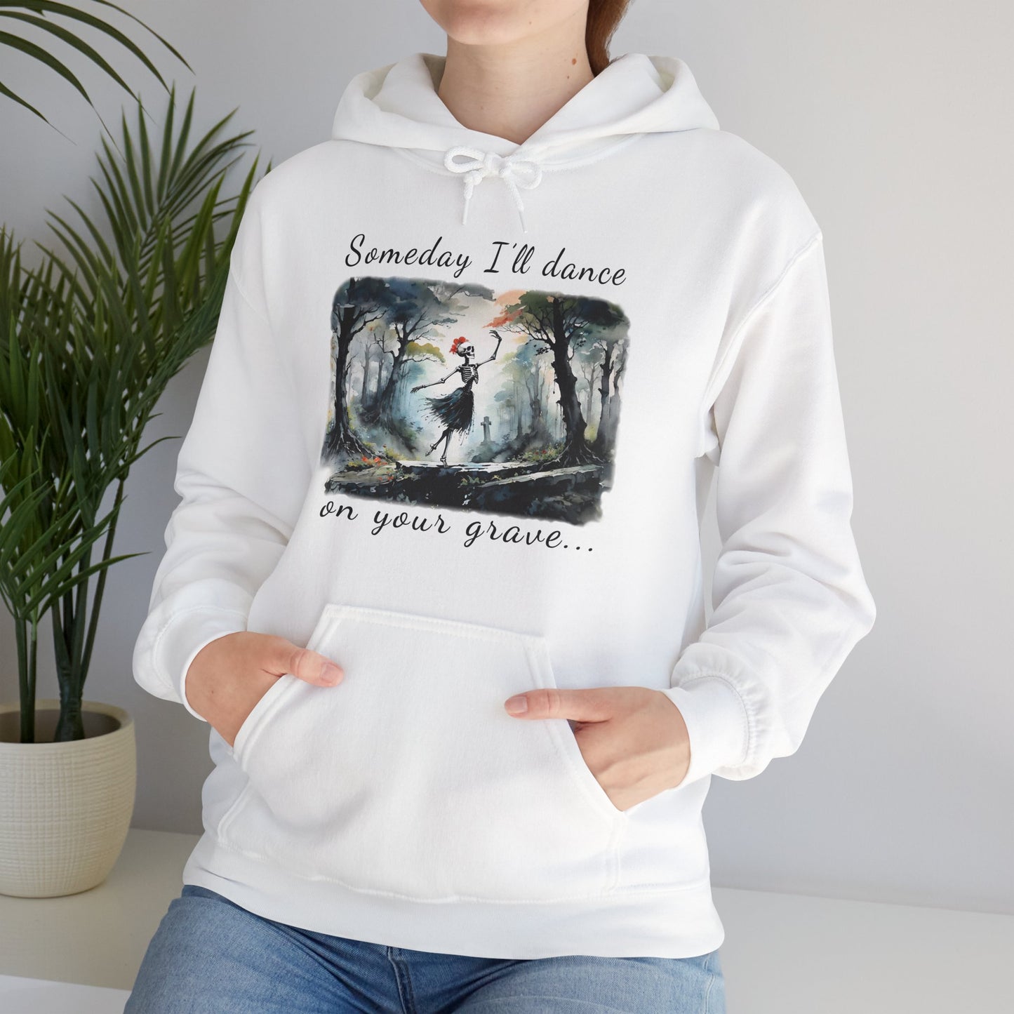 This Haunting Skeleton Hoodie is perfect for ladies who love things that are spooky and macabre. This hooded sweatshirt design is both stunning and chilling. Available stylish white Unisex Hoodies.