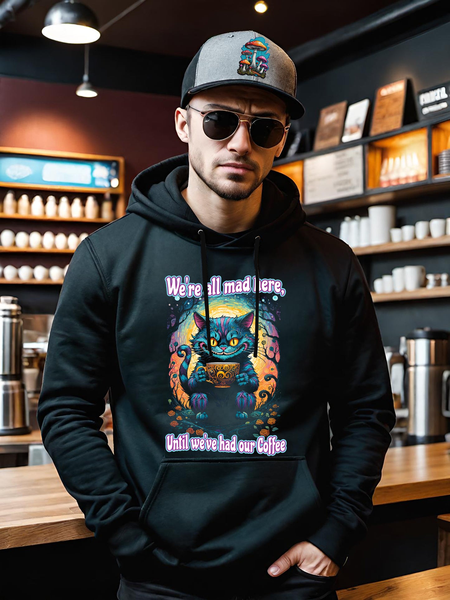 This colorful Cheshire Cat Hoodie looks awesome on black. This Unisex Hoodie is a black half-tone. The black ink is negative space letting the fabric shine through. Get this enchanting Cheshire Cat Unisex Cotton Hoodie.