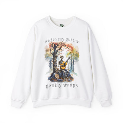 This gothic skeleton sweatshirt featuring a grisly guitarist jamming on an acoustic guitar in a haunting watercolor forest is a stunning tongue-in-cheek homage to the Beatles music. This stylish gothic skeleton design looks great on this Gildan unisex heavy cotton sweatshirt