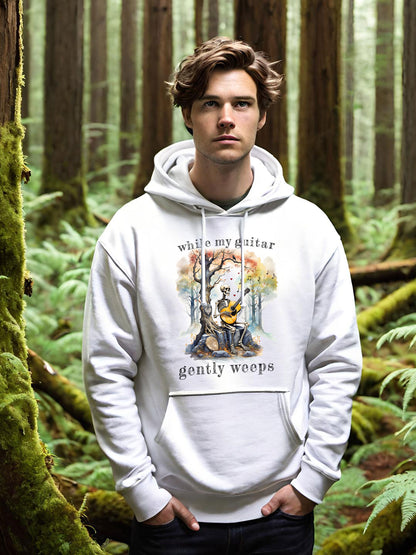 This gothic skeleton hoodies featuring a grisly guitarist jamming on an acoustic guitar in a haunting watercolor forest is a stunning tongue-in-cheek homage to the Beatles music. This cool dude looks great in this Gildan unisex heavy cotton hooded sweatshirt